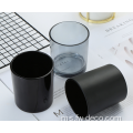 Pemegang lilin tealight kaca hitam dengan penutup buluh